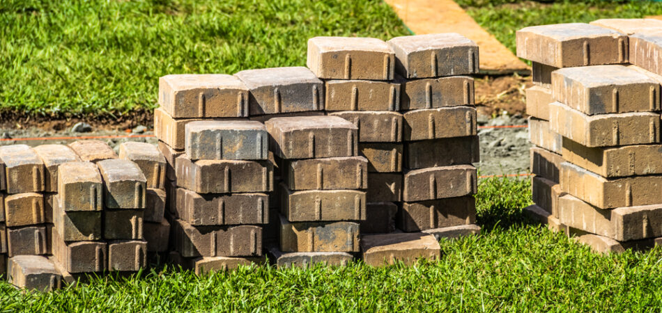 Bricks,stacked,up,on,a,job,site,before,being,laid